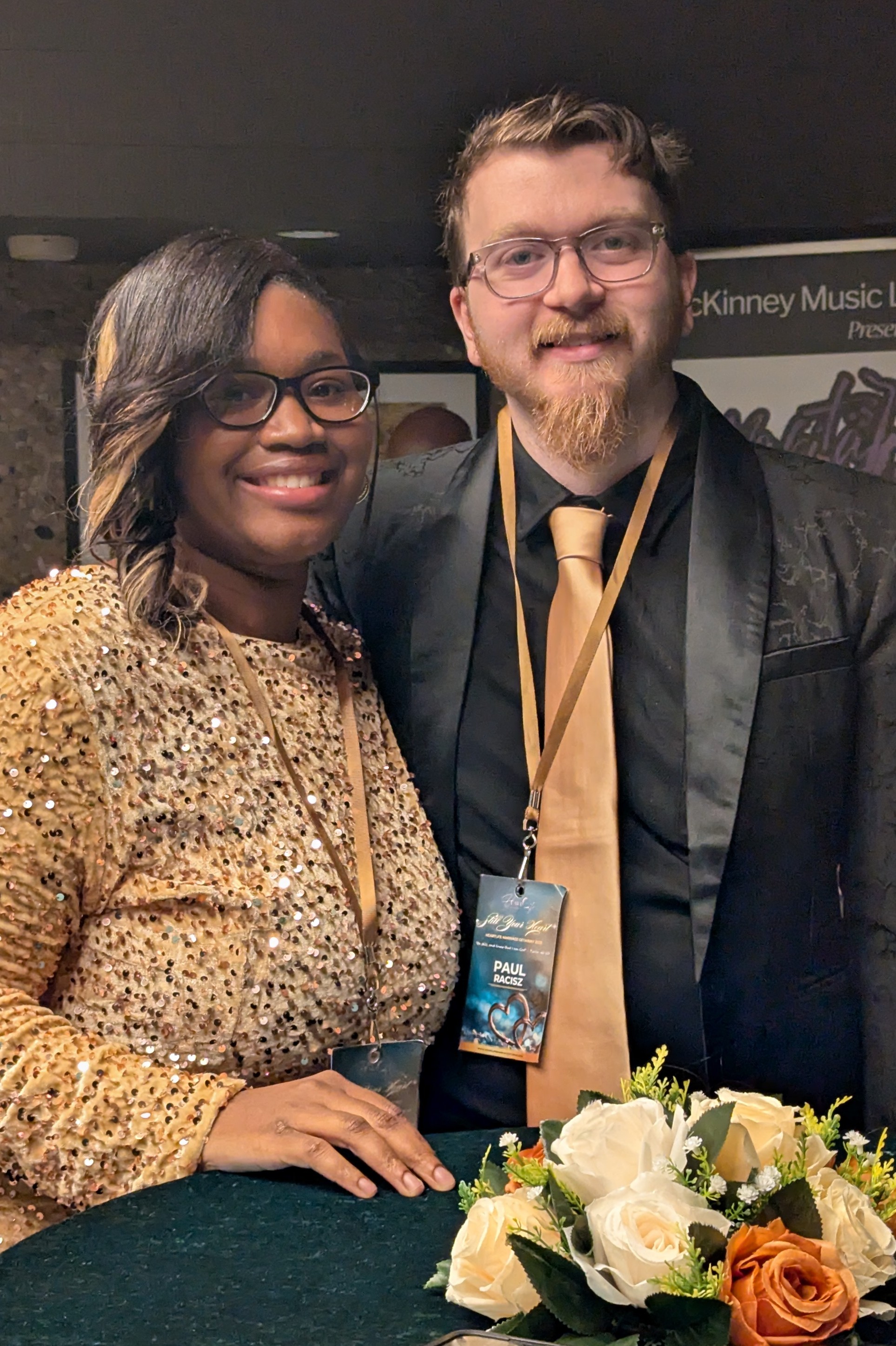 couple wearing suit and dress